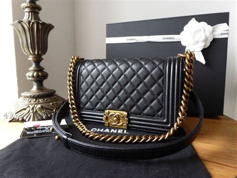 black chanel boy bag with gold hardware|chanel boy bag gold chain.